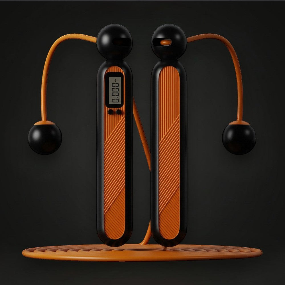 GYMFINDSHUB cordless weighted jump rope with digital display, black and orange ergonomic handles on dark background