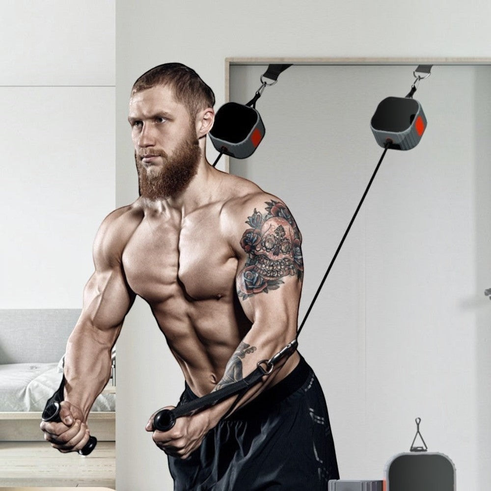 GYMFINDSHUB portable resistance cable system used by a muscular man for chest exercises in a home gym setting.